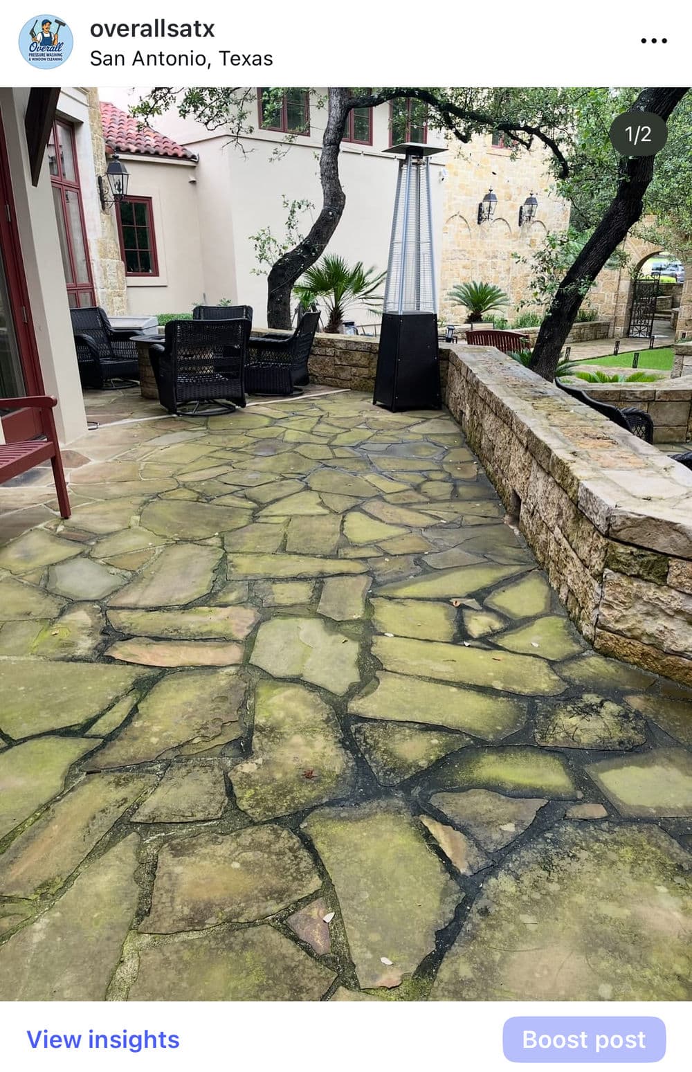Stone patio with outdoor seating, surrounded by trees and greenery in San Antonio, Texas.